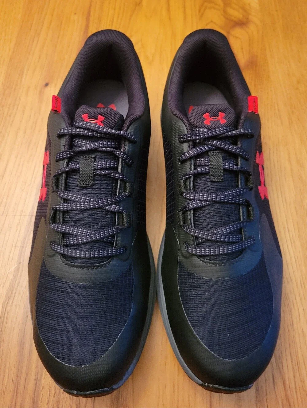 Under Armour Men's Black Running Sneakers with Red Logo Accents